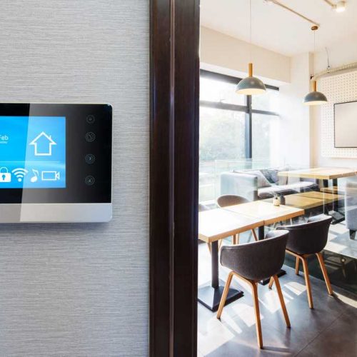 smart home app in control panel in modern restaurant